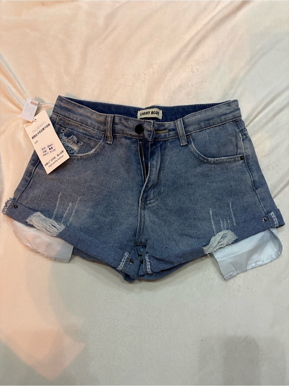 Light Blue Distressed Denim Shorts